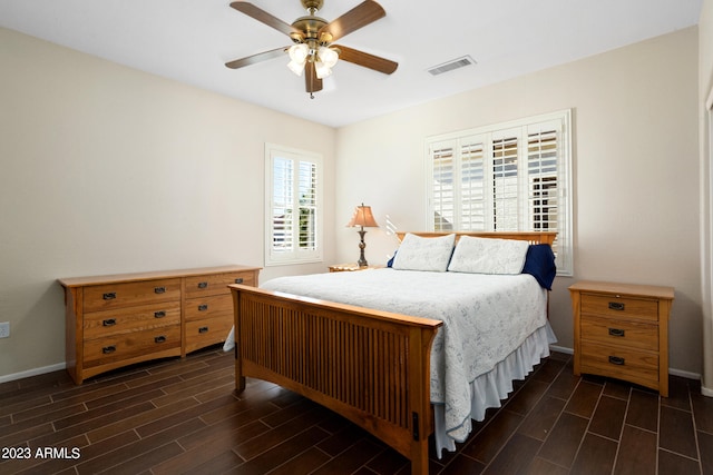 bedroom featuring dark wood-type flooring and ceiling fan