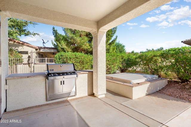 view of patio with a grill