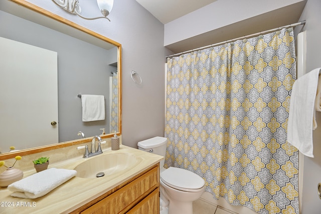 bathroom with a shower with curtain, vanity, tile patterned flooring, and toilet