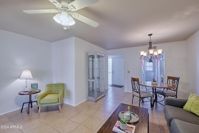 tiled living room with ceiling fan