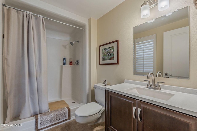 full bathroom with vanity, tile patterned flooring, curtained shower, and toilet