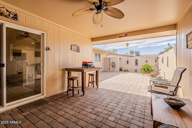 view of patio / terrace with ceiling fan and a fenced backyard