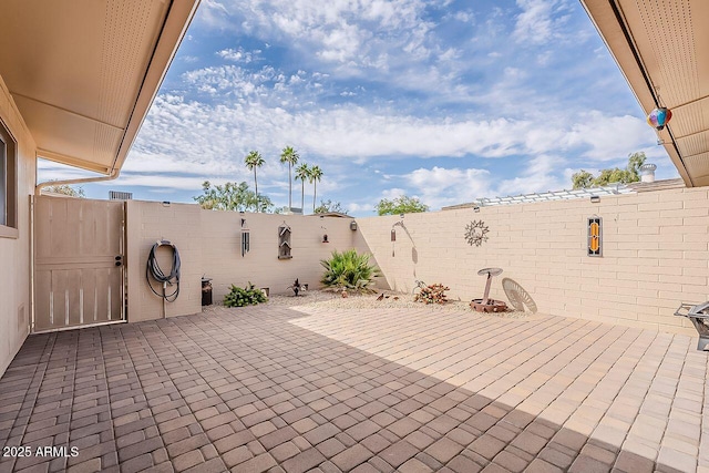 view of patio featuring a fenced backyard