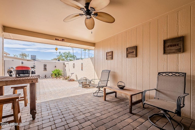 view of patio featuring ceiling fan and a fenced backyard