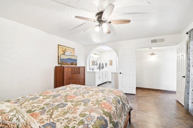 bedroom with tile patterned floors and ceiling fan