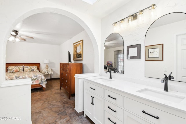 bathroom with vanity and ceiling fan