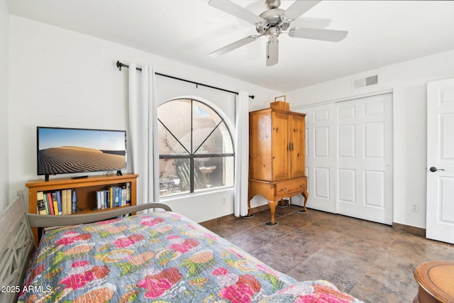 bedroom featuring a closet and ceiling fan