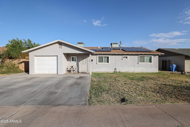 3440 W Krall St, Phoenix, AZ 85017 - single story home featuring a front yard, solar panels, and a garage
