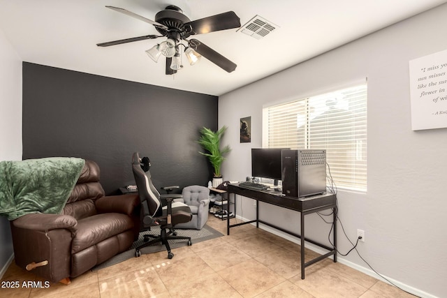 office area featuring ceiling fan and light tile patterned floors