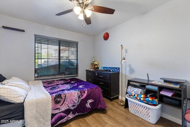 839 S Westwood Unit 154, Mesa, AZ 85210 - bedroom featuring wood finished floors, ceiling fan, and baseboards