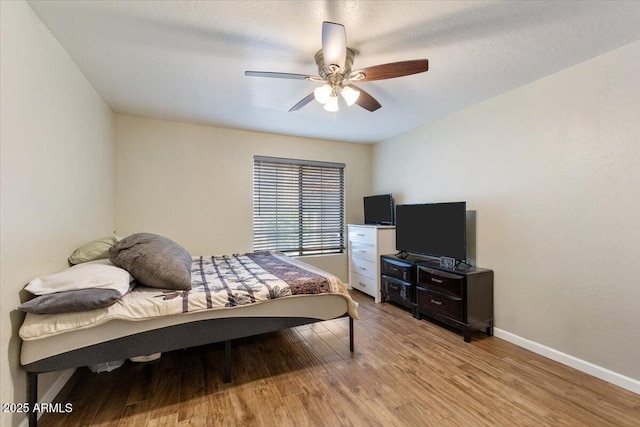 839 S Westwood Unit 154, Mesa, AZ 85210 - bedroom with light wood-style floors, baseboards, and a ceiling fan