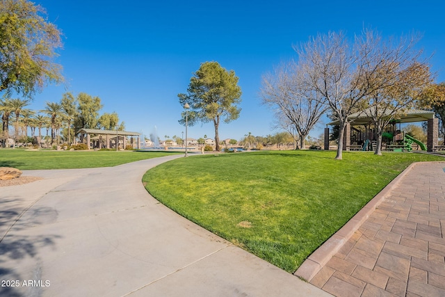 surrounding community featuring a lawn