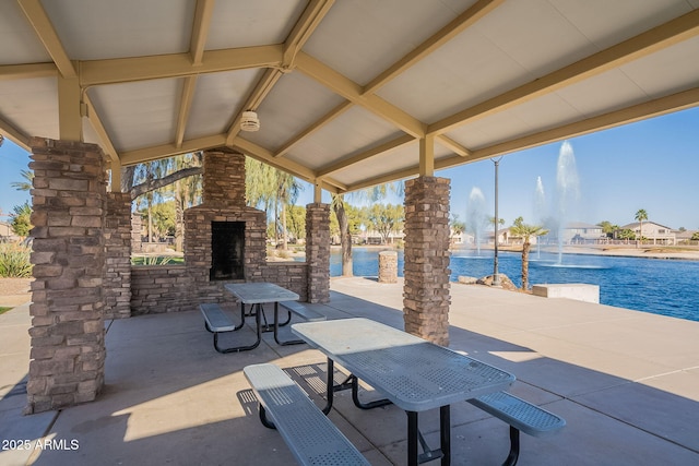 view of patio / terrace with a water view