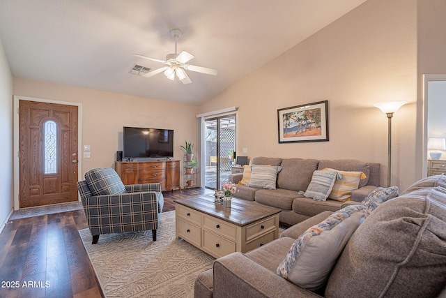 living room with lofted ceiling, ceiling fan, and hardwood / wood-style floors