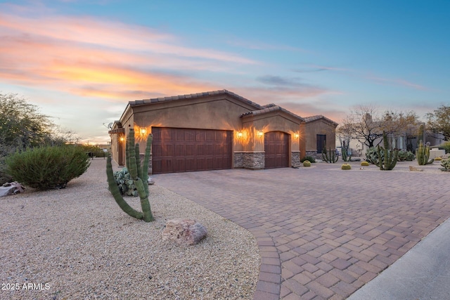 view of front of home with a garage