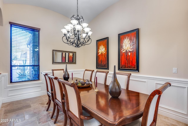 dining space with a chandelier