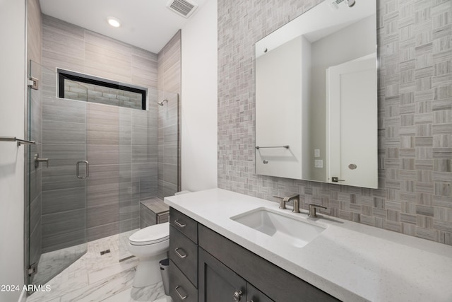 full bath with visible vents, backsplash, toilet, a shower stall, and vanity