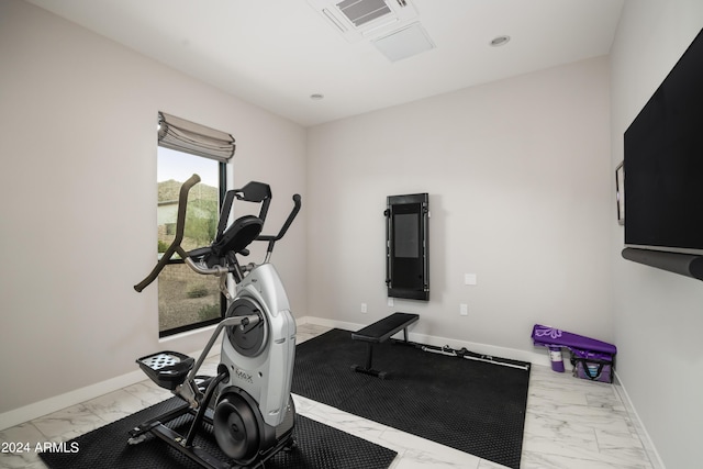 workout area with marble finish floor, recessed lighting, visible vents, and baseboards