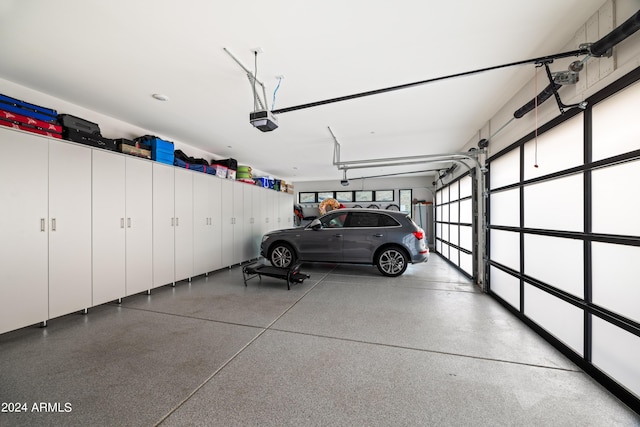 garage featuring a garage door opener