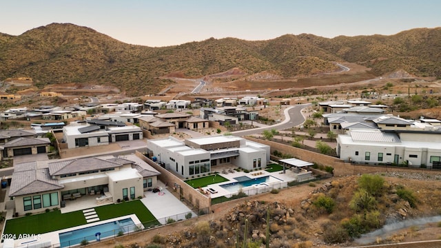 aerial view featuring a residential view and a mountain view