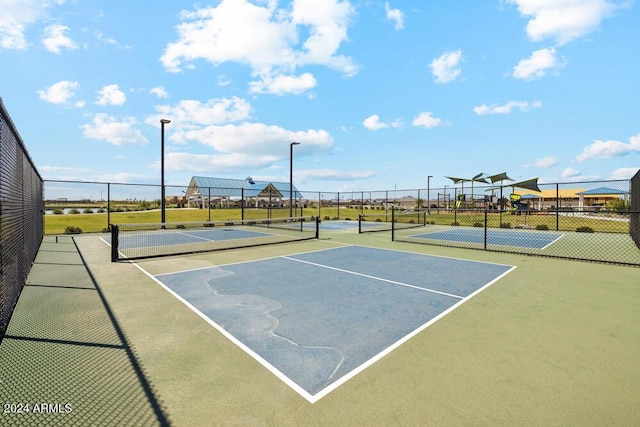 view of sport court featuring basketball hoop