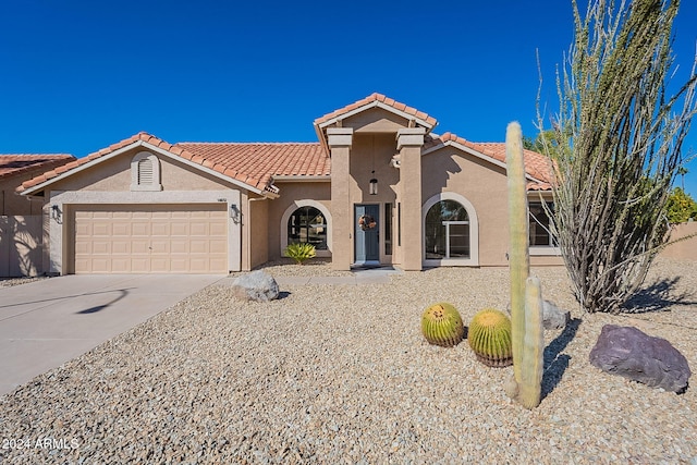 view of front of home with a garage