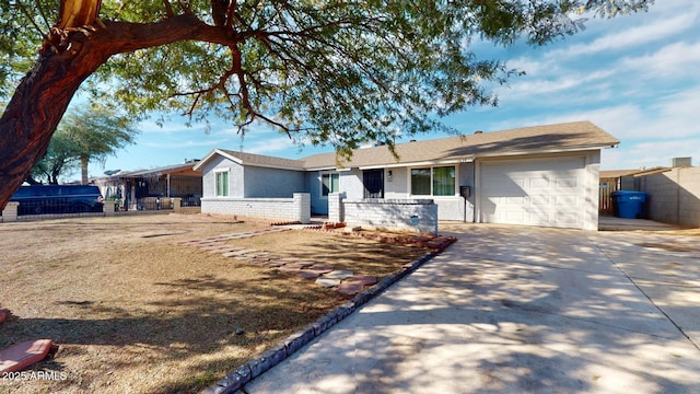 ranch-style home featuring a garage