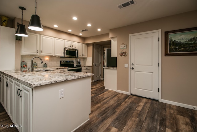 kitchen featuring pendant lighting, sink, white cabinets, kitchen peninsula, and black range with electric stovetop