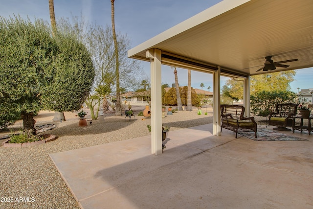 view of patio featuring outdoor lounge area and ceiling fan