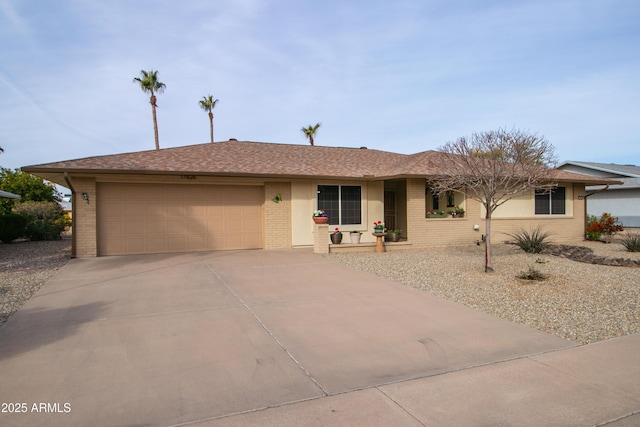 ranch-style house featuring a garage