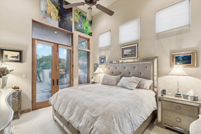 7846 E Wilderness Trl, Gold Canyon, AZ 85118 - carpeted bedroom with a high ceiling, access to outside, french doors, and baseboards