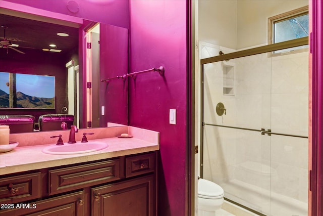 7846 E Wilderness Trl, Gold Canyon, AZ 85118 - full bath with toilet, a stall shower, vanity, and a ceiling fan