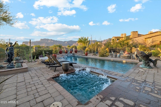 7846 E Wilderness Trl, Gold Canyon, AZ 85118 - view of pool featuring an in-ground hot tub, a patio area, and a mountain view