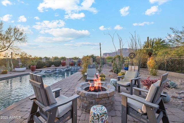 7846 E Wilderness Trl, Gold Canyon, AZ 85118 - fenced backyard featuring a fire pit and a patio area