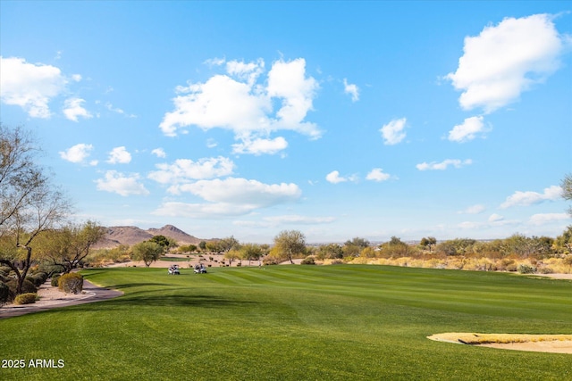 7846 E Wilderness Trl, Gold Canyon, AZ 85118 - view of community featuring a mountain view, a yard, and golf course view