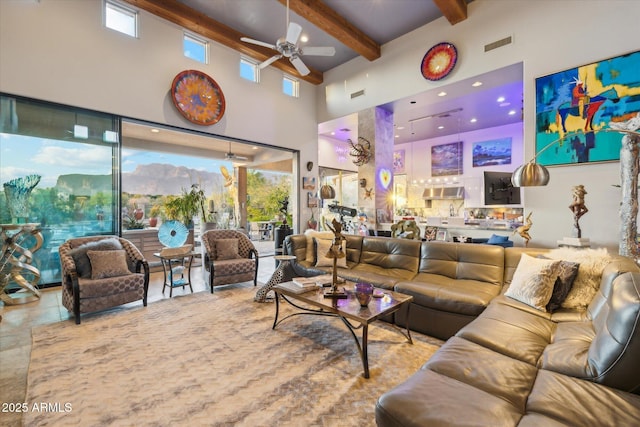7846 E Wilderness Trl, Gold Canyon, AZ 85118 - living area with a high ceiling, beamed ceiling, and ceiling fan