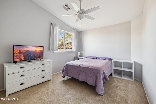 bedroom featuring vaulted ceiling, baseboards, visible vents, and light carpet