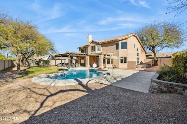 view of pool featuring a fenced in pool, a fenced backyard, and a patio area