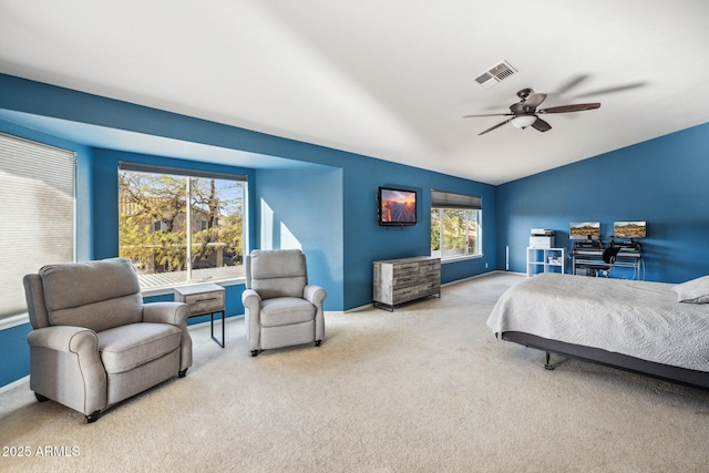 bedroom with lofted ceiling, carpet flooring, visible vents, and ceiling fan