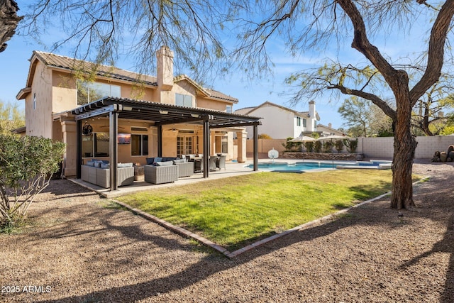 back of house with an outdoor living space, a patio, a fenced backyard, and ceiling fan