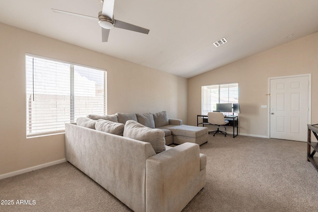living area featuring light carpet, lofted ceiling, baseboards, and ceiling fan