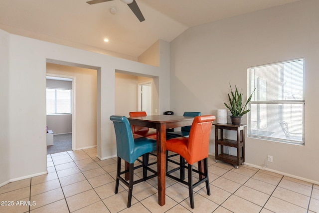dining room with vaulted ceiling, a ceiling fan, baseboards, light tile patterned floors, and recessed lighting