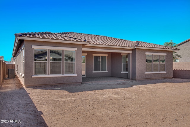 16994 W Canterbury Dr, Surprise, AZ 85388 - rear view of property with a fenced backyard, a tile roof, central air condition unit, stucco siding, and a patio area