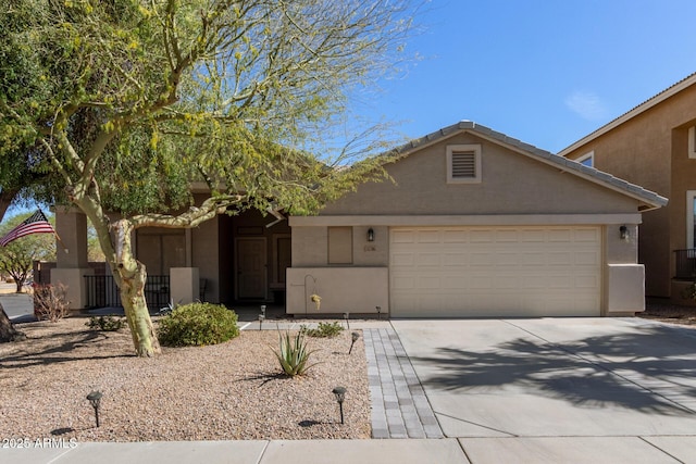 view of front of property featuring a garage