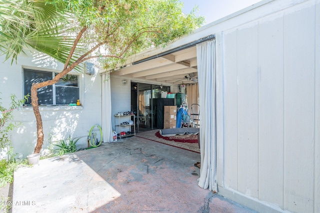 view of patio with ceiling fan