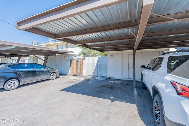 view of car parking featuring a carport