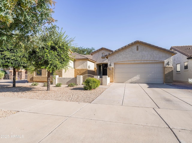 19403 E Arrowhead Trl, Queen Creek, AZ 85142 - view of front of home with driveway, stucco siding, an attached garage, and a tile roof