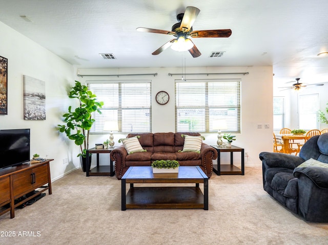 19403 E Arrowhead Trl, Queen Creek, AZ 85142 - living area with ceiling fan, light colored carpet, and plenty of natural light
