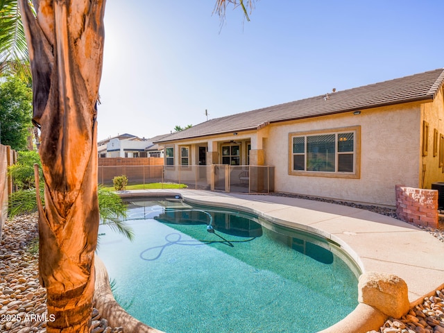 19403 E Arrowhead Trl, Queen Creek, AZ 85142 - view of swimming pool featuring a fenced backyard, central AC, and a patio area