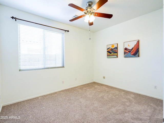 19403 E Arrowhead Trl, Queen Creek, AZ 85142 - spare room featuring carpet floors, ceiling fan, and baseboards